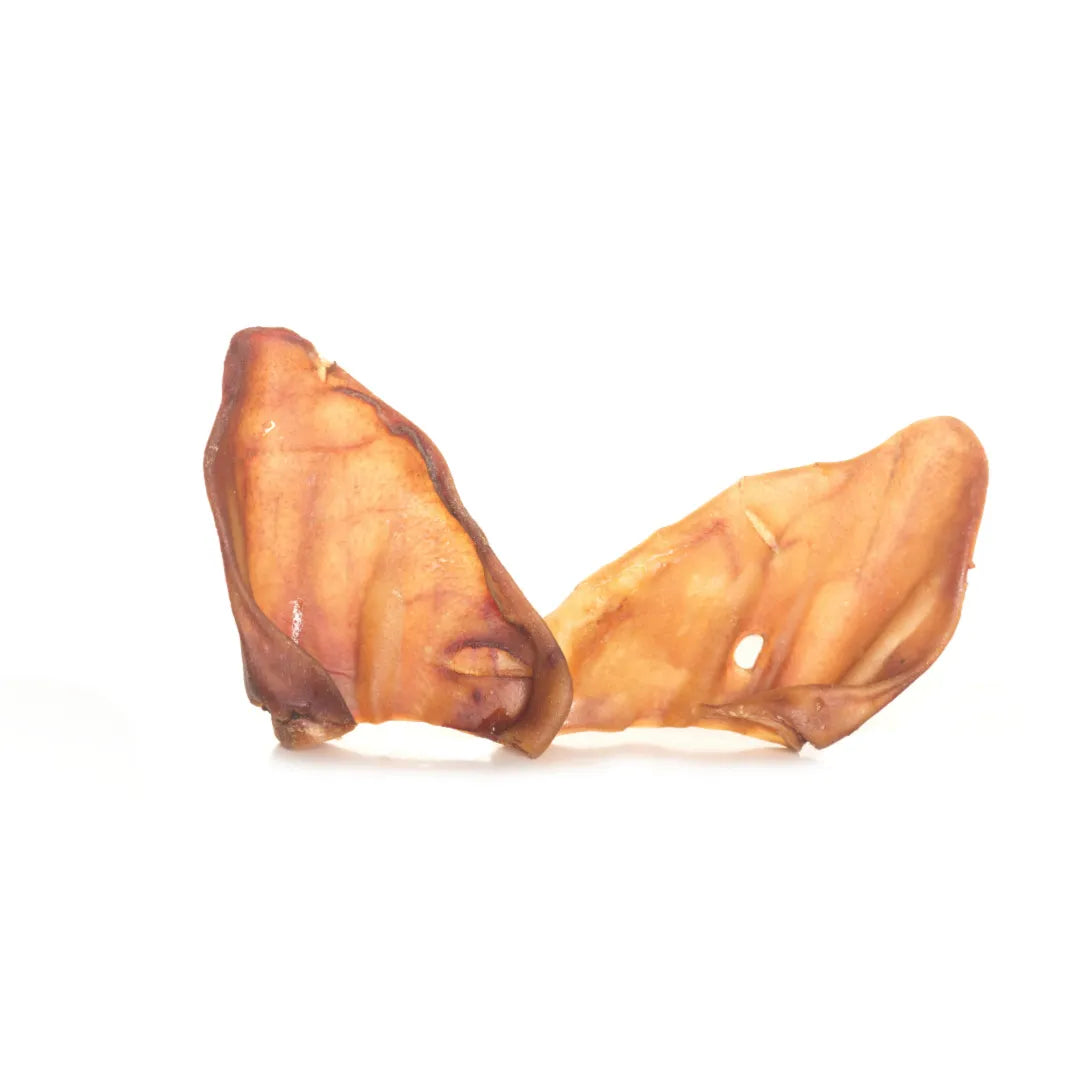 Traditional dried pig ears for dogs, natural chew treat promoting dental hygiene and healthy gums