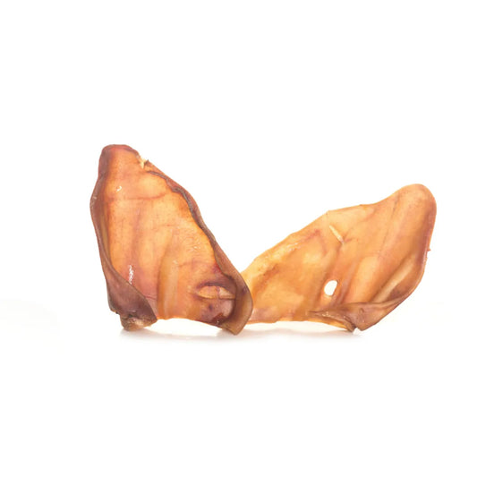 Traditional dried pig ears for dogs, natural chew treat promoting dental hygiene and healthy gums